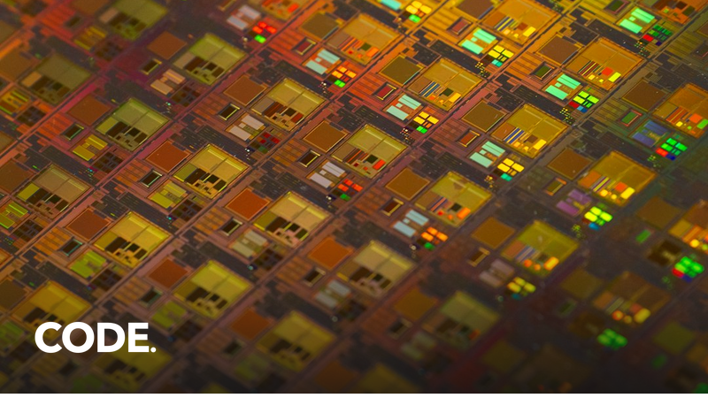 半導体ウエハーのクローズアップ（AI アクセラレータの製造を示すイメージ）